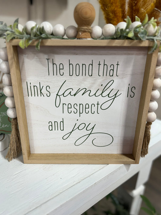 The Bond That Links Family Sign